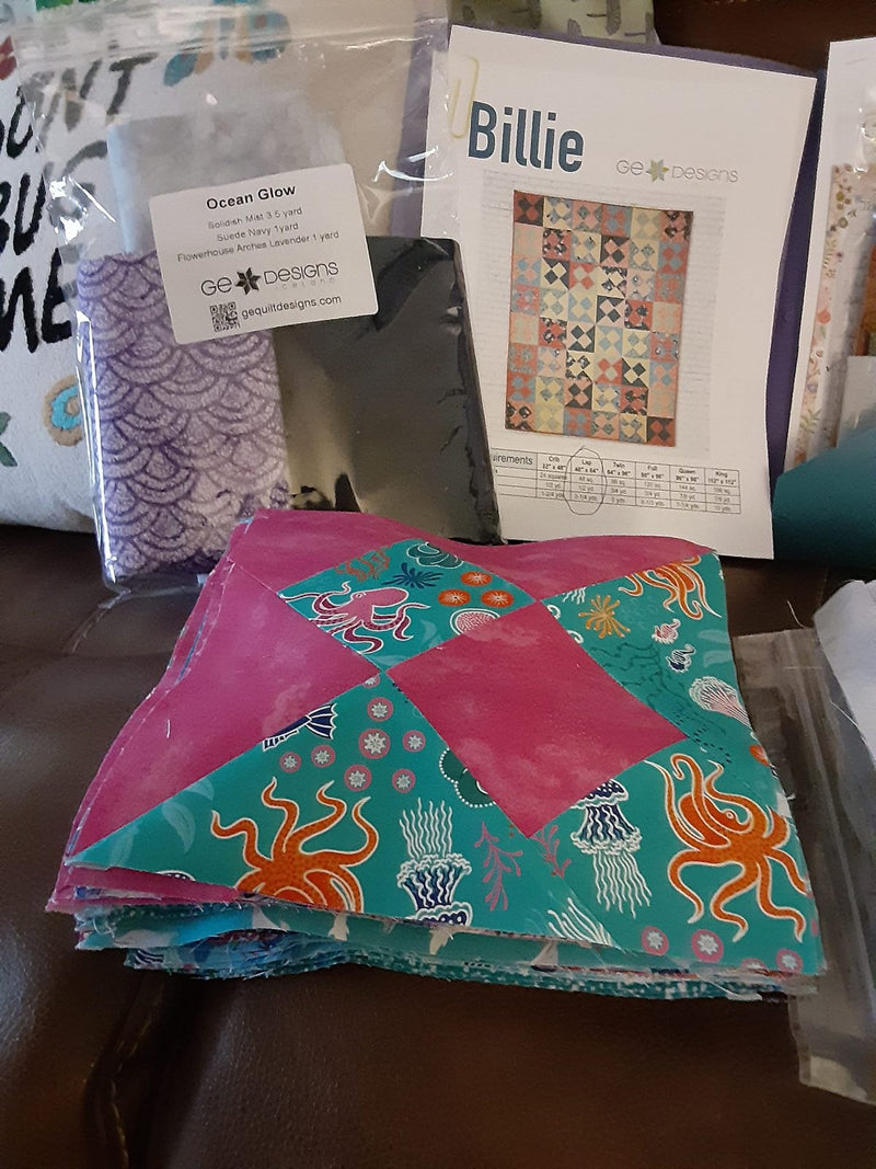 Quilt blocks in progress with the fabric pack and pattern