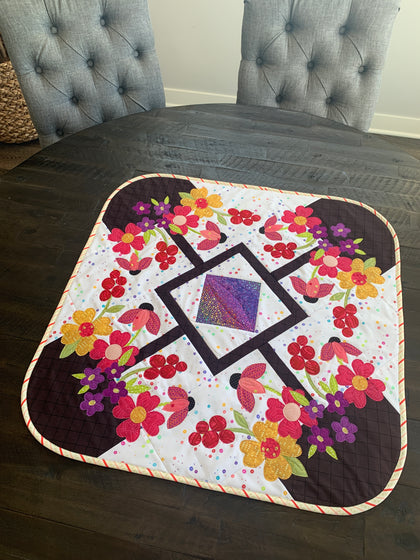 May Baskets Table Topper, a finished Quilt As You Go project